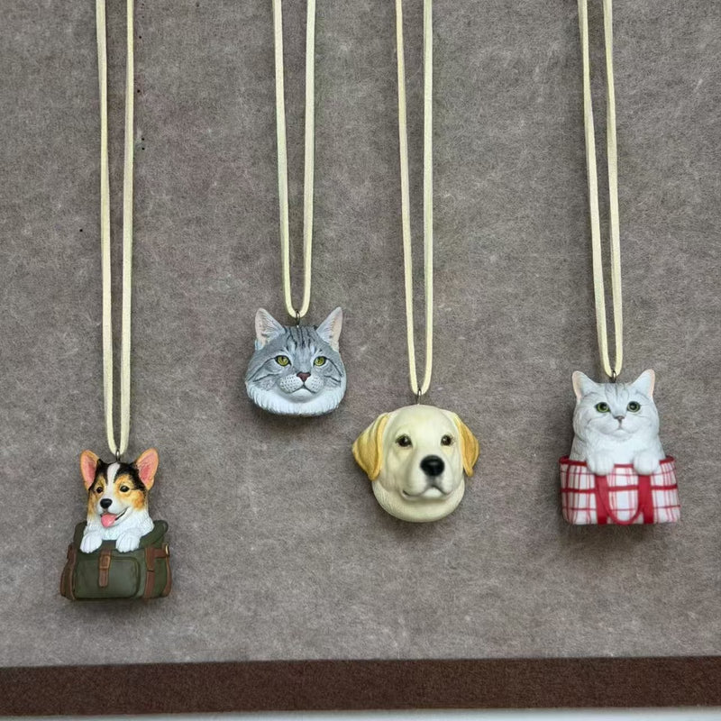 Custom 3D pet charms of a corgi, tabby cat, labrador, and silver cat on cords
